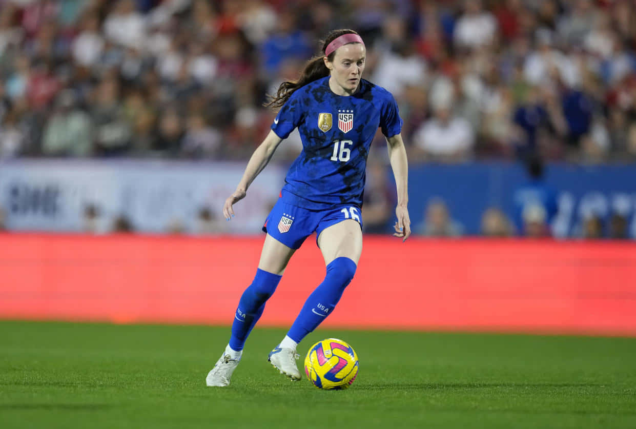 Download Rose Lavelle U S A Soccer Action Wallpaper | Wallpapers.com