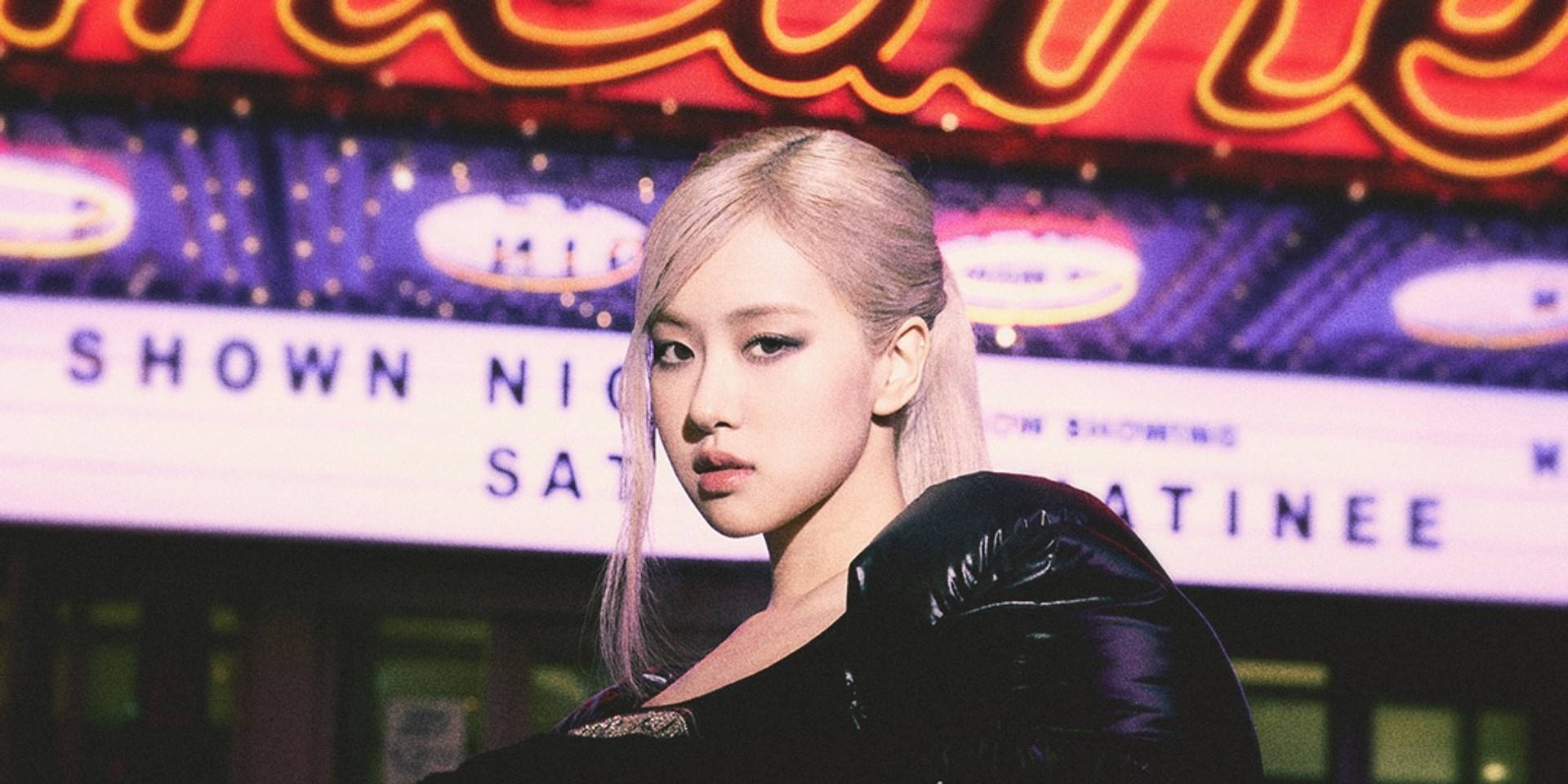 Roseanne Park showcasing a stylish ponytail hairstyle. Wallpaper