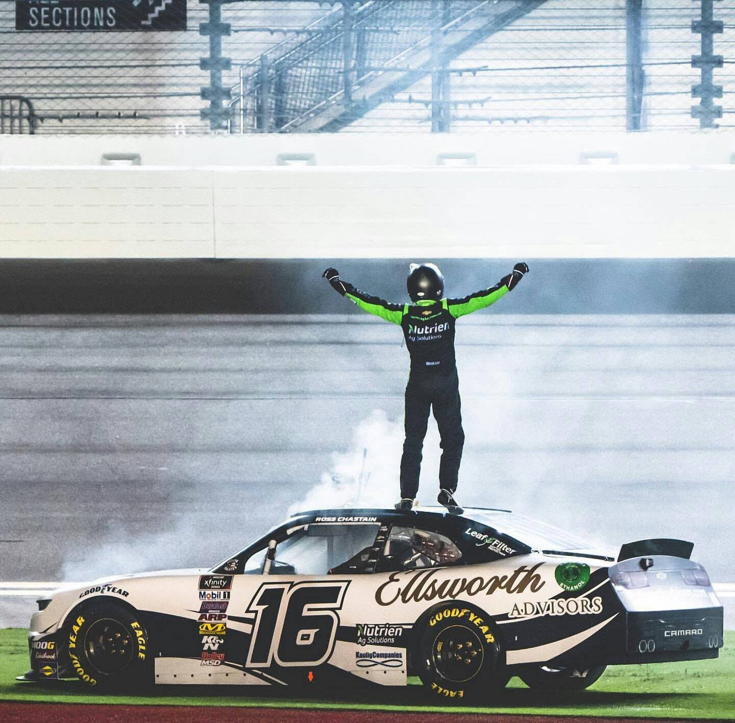 Ross Chastain On Top Of Car Wallpaper