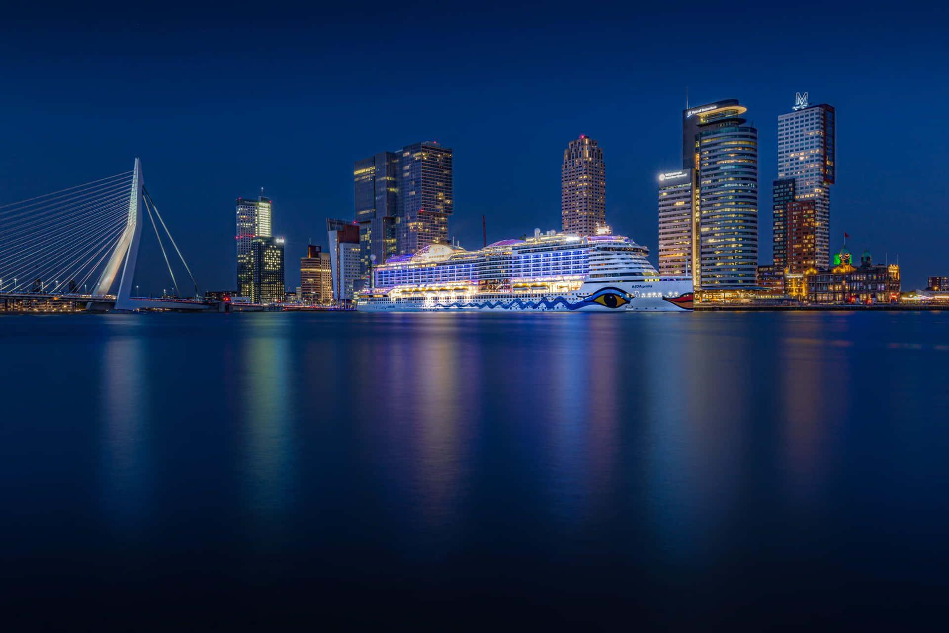 Rotterdam Skylineand Cruise Shipat Twilight Wallpaper