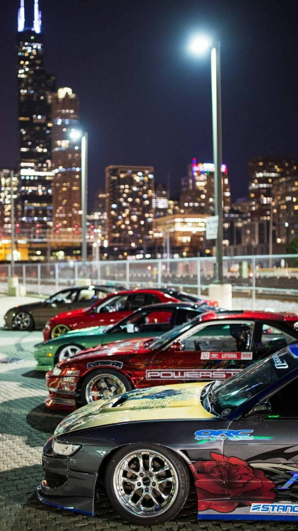 Row Of JDM Cars At Night Wallpaper