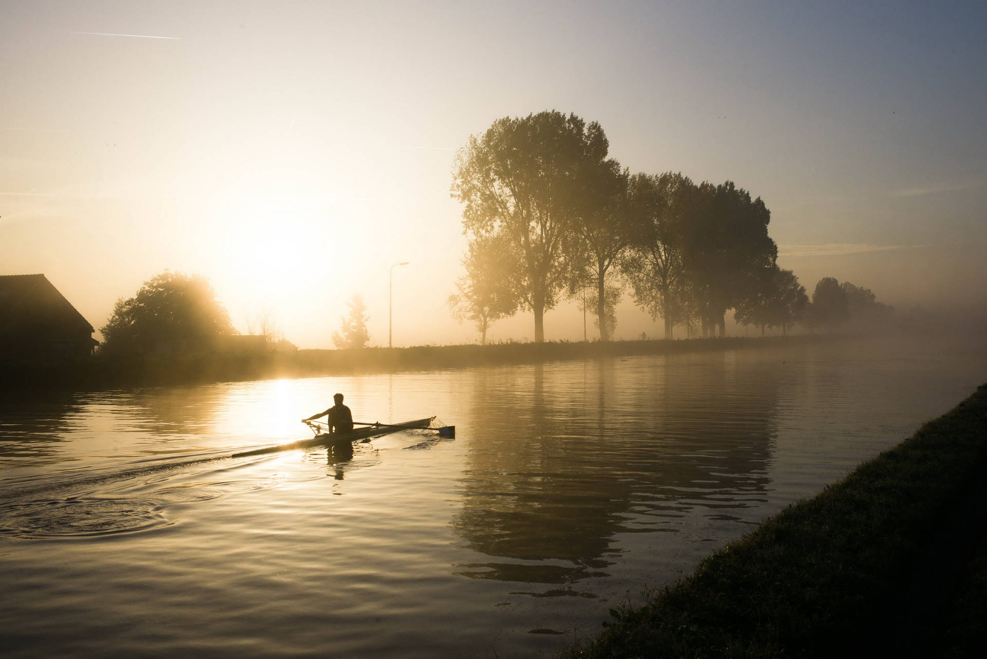 Rowing During Sunrise Wallpaper