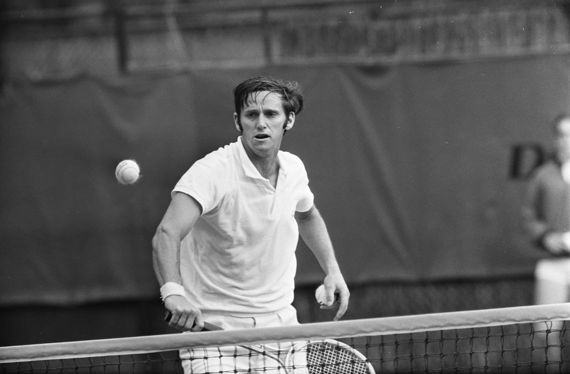 Tennis Legend Roy Emerson in Action During a Match in Netherlands, 1969 Wallpaper