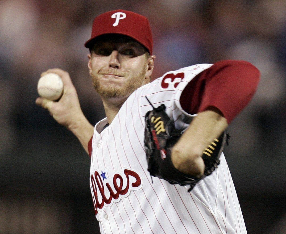 Roy Halladay Focused While Throwing Baseball Wallpaper