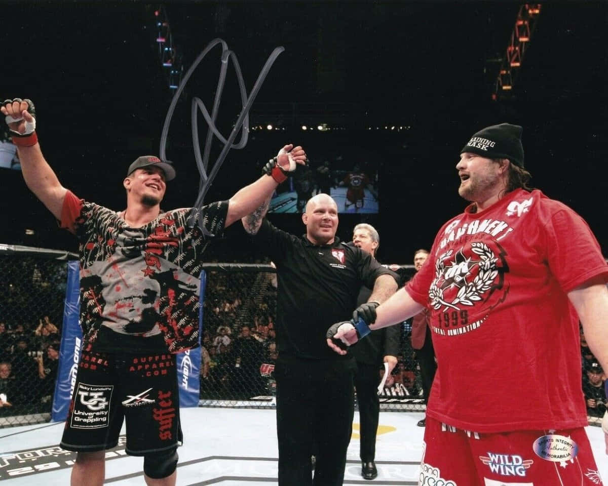 Roy Nelson And Frank Mir Celebrate At Ufc 130 Wallpaper