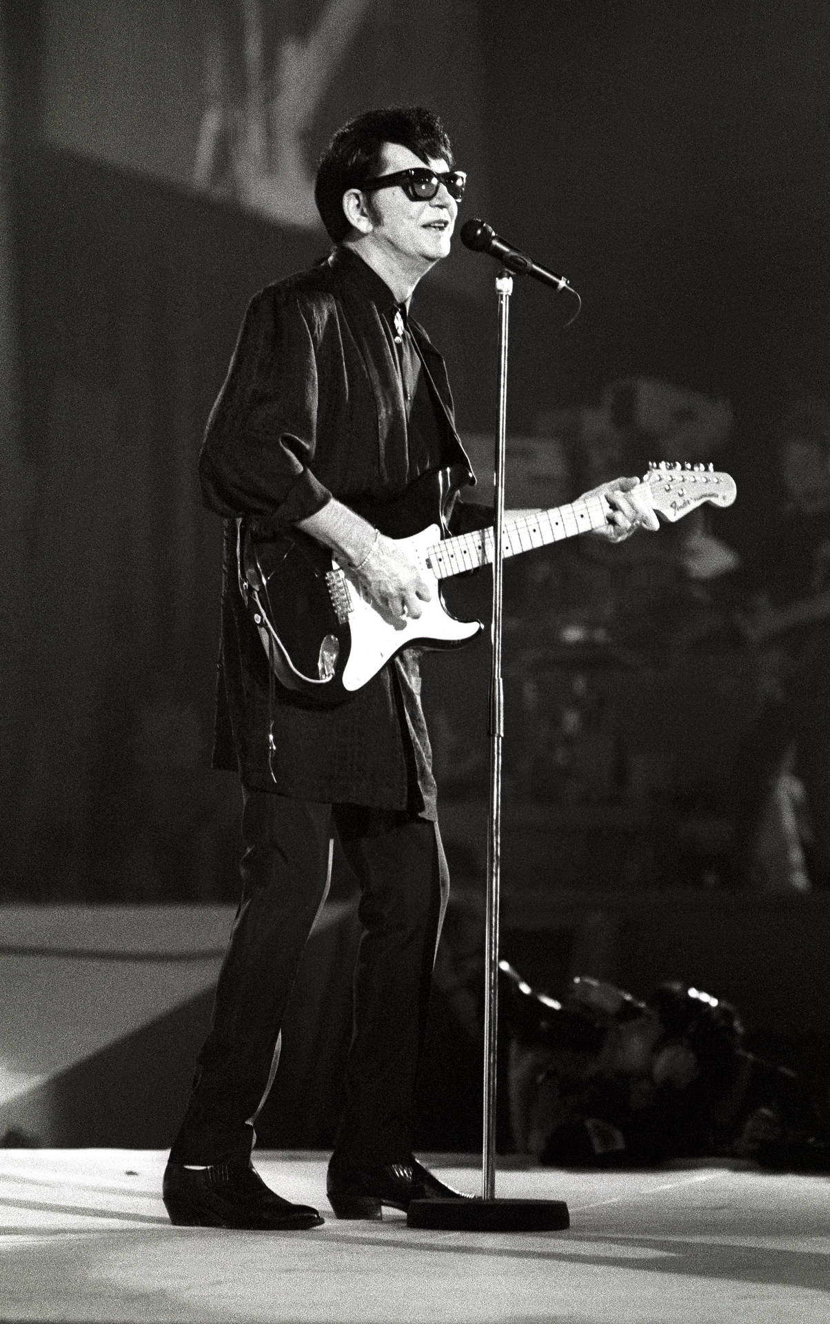 Roy Orbison Live Performance On Stage Wallpaper