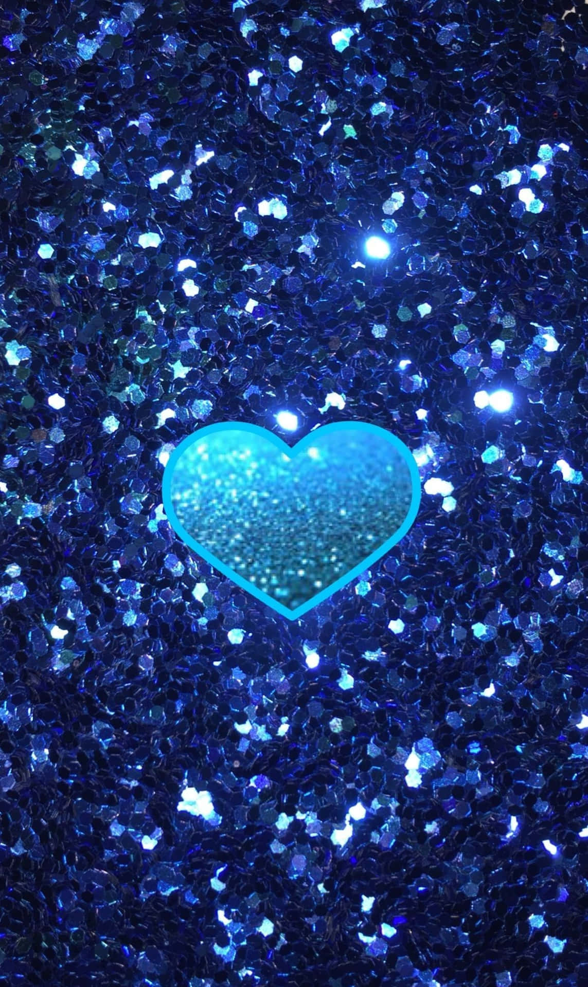 Glowing Heart In Glittering Royal Blue Background