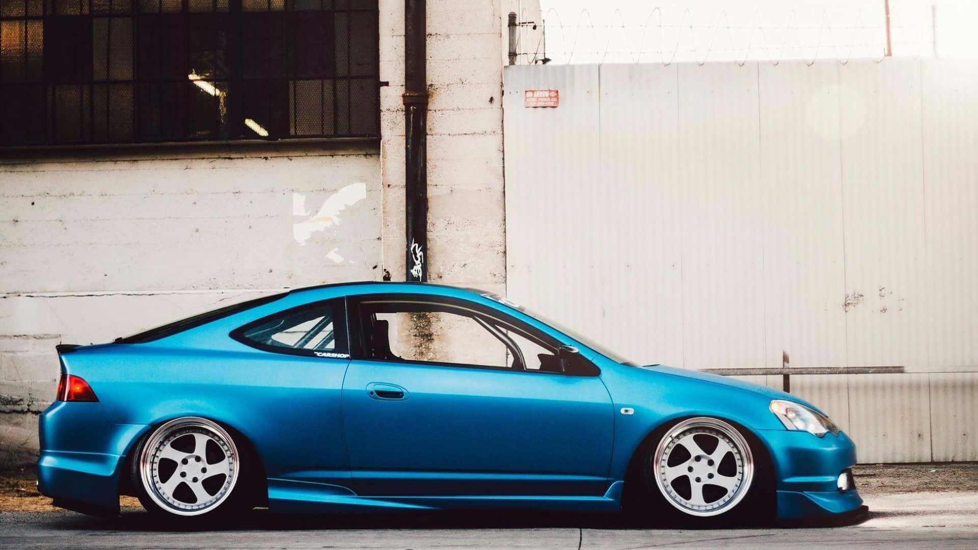 Caption: A sleek Acura RSX Type-S in its full glory Wallpaper