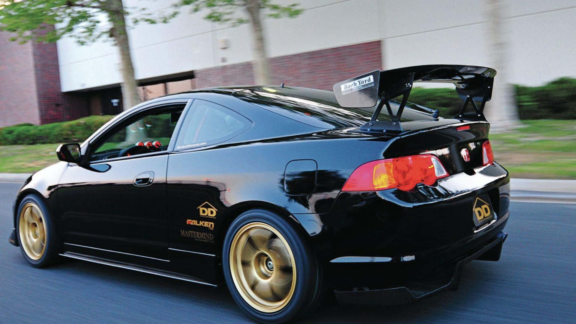 black acura rsx with gold rims