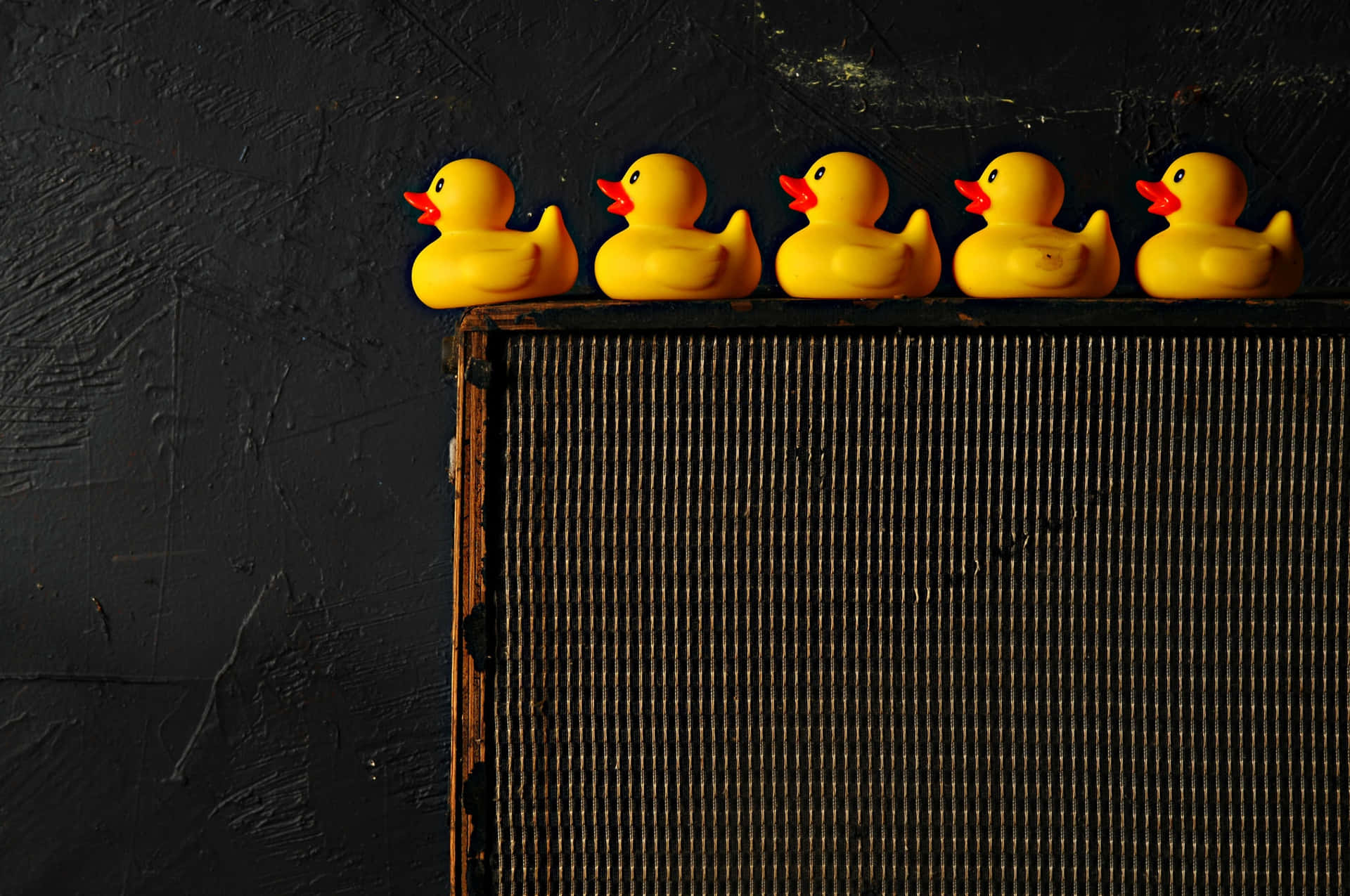 Rubber Ducksina Rowon Dark Background.jpg Wallpaper
