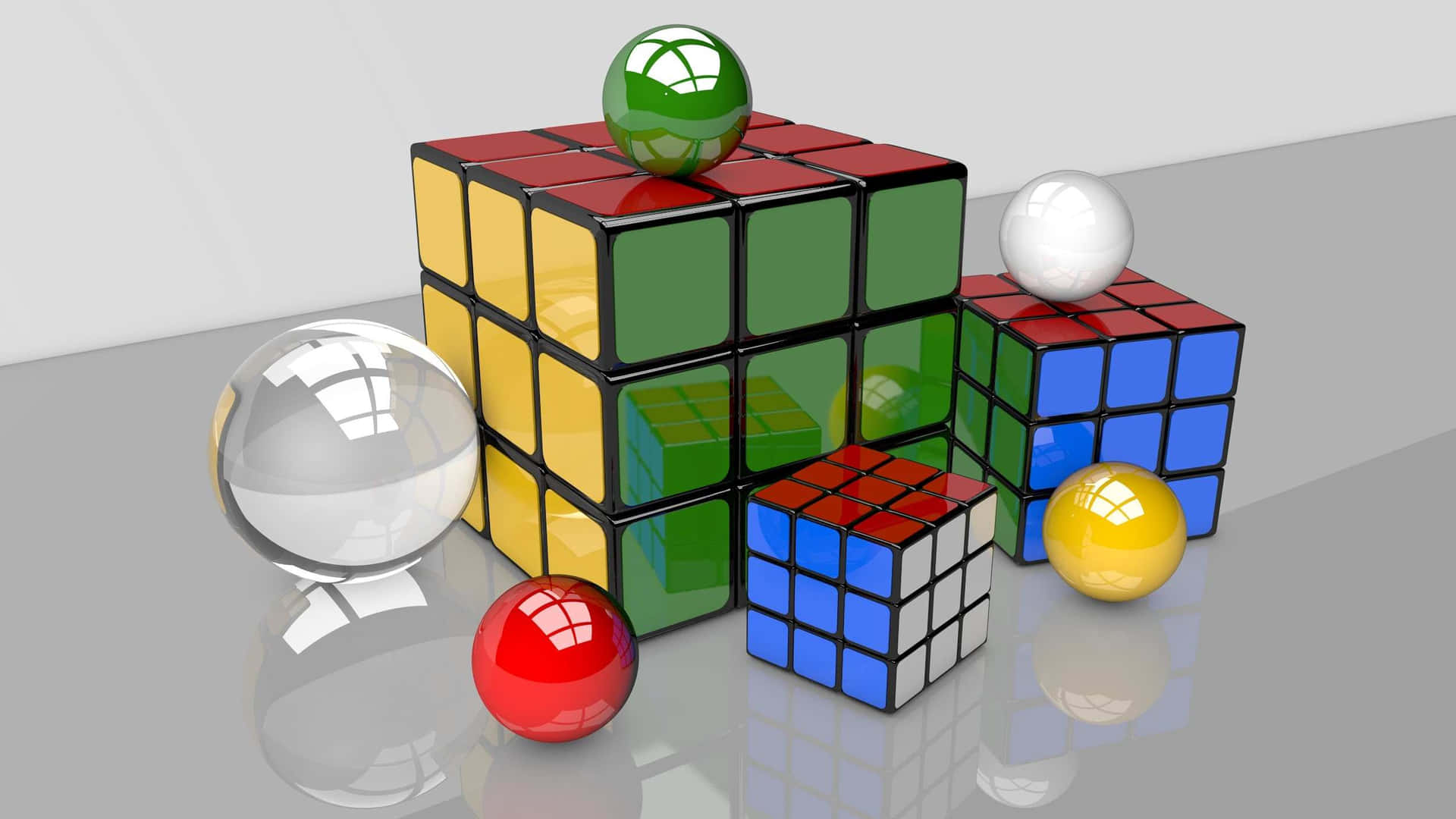 Rubiks Cubeand Reflective Spheres Wallpaper