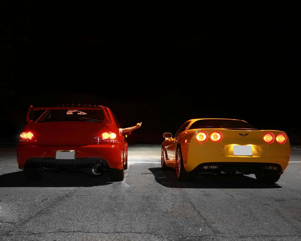 A Red And Yellow Sports Car Wallpaper