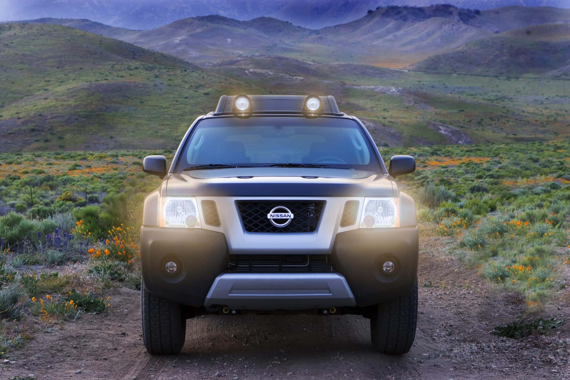 Rugged Nissan Xterra Tackling Off-road Terrain. Wallpaper