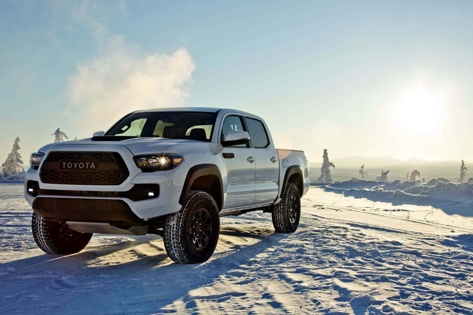 Rugged Off-road Toyota Tacoma In Action Wallpaper