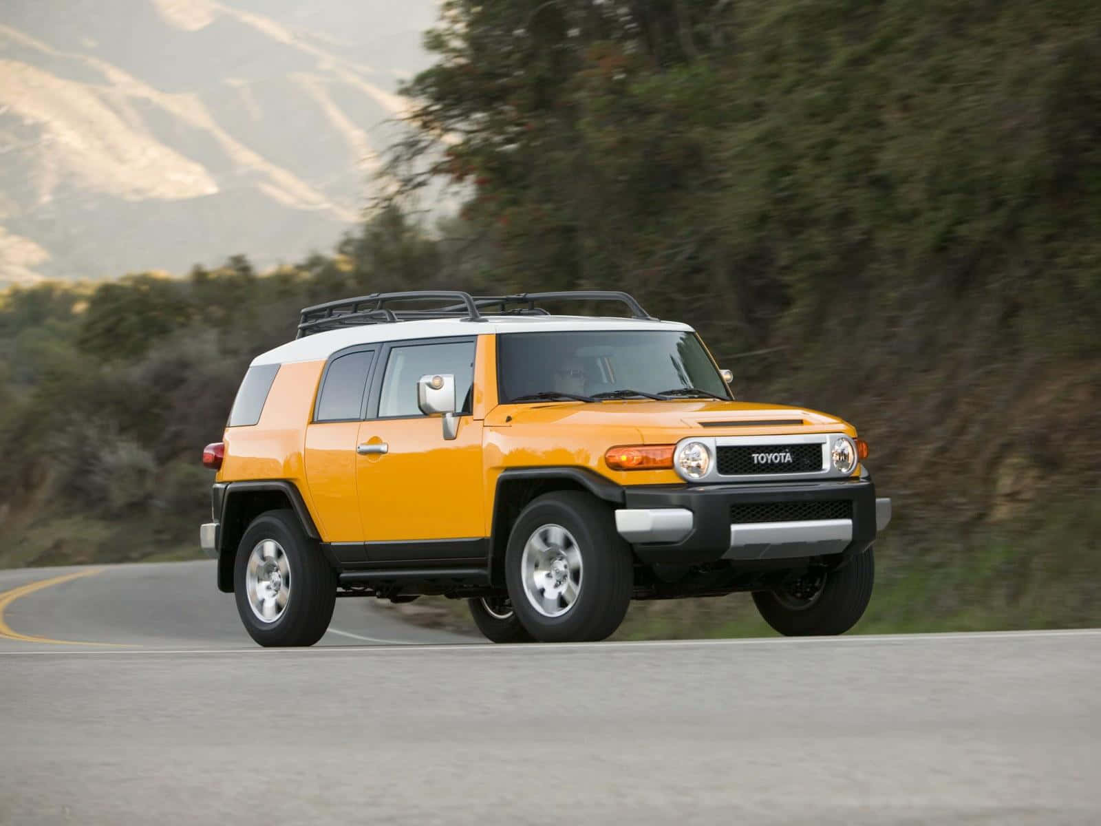 Rugged Sophistication - Toyota Fj Cruiser On Off-road Adventure Wallpaper