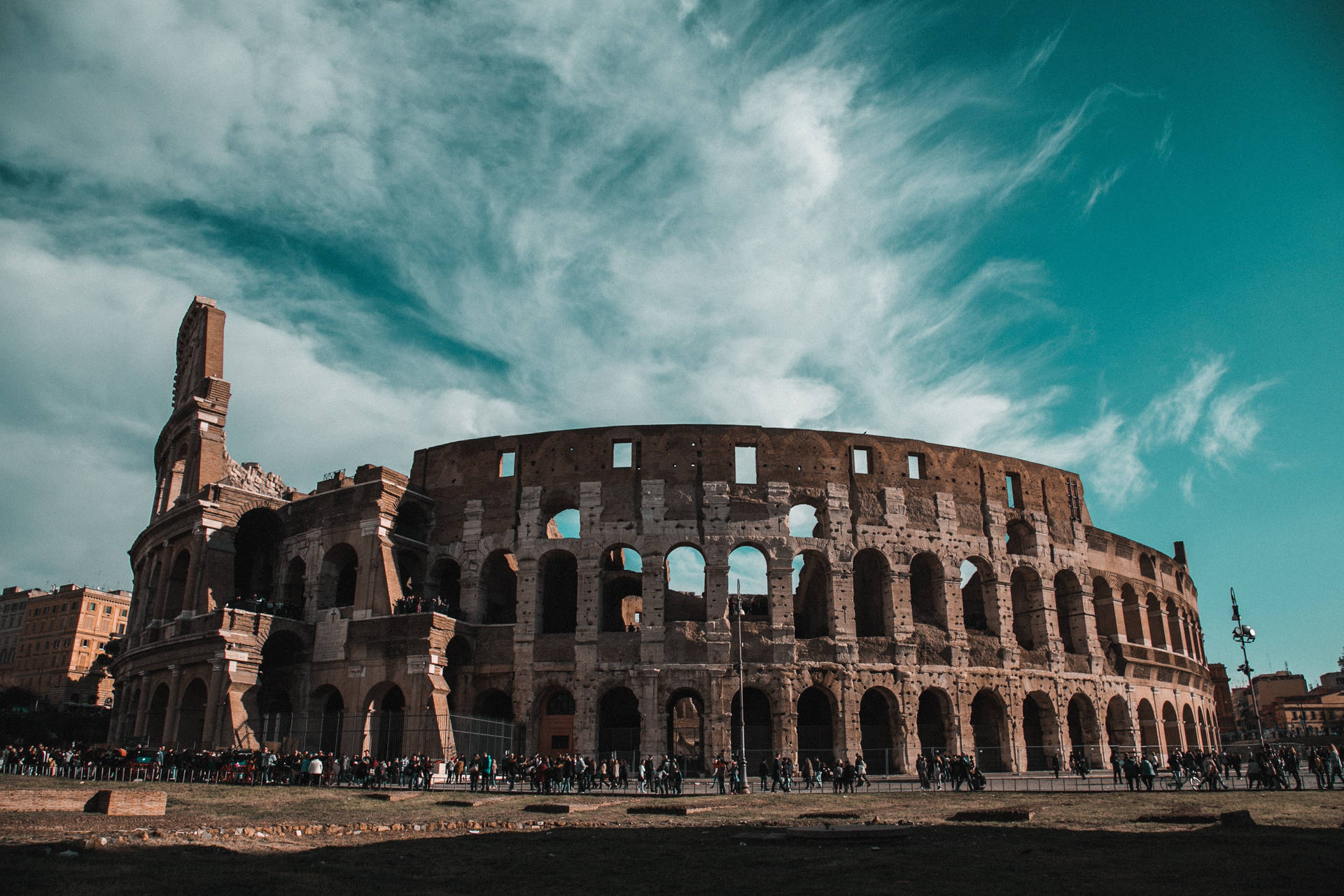 Ruins Of The Colosseum Beneath Dark Blue Sky Wallpaper