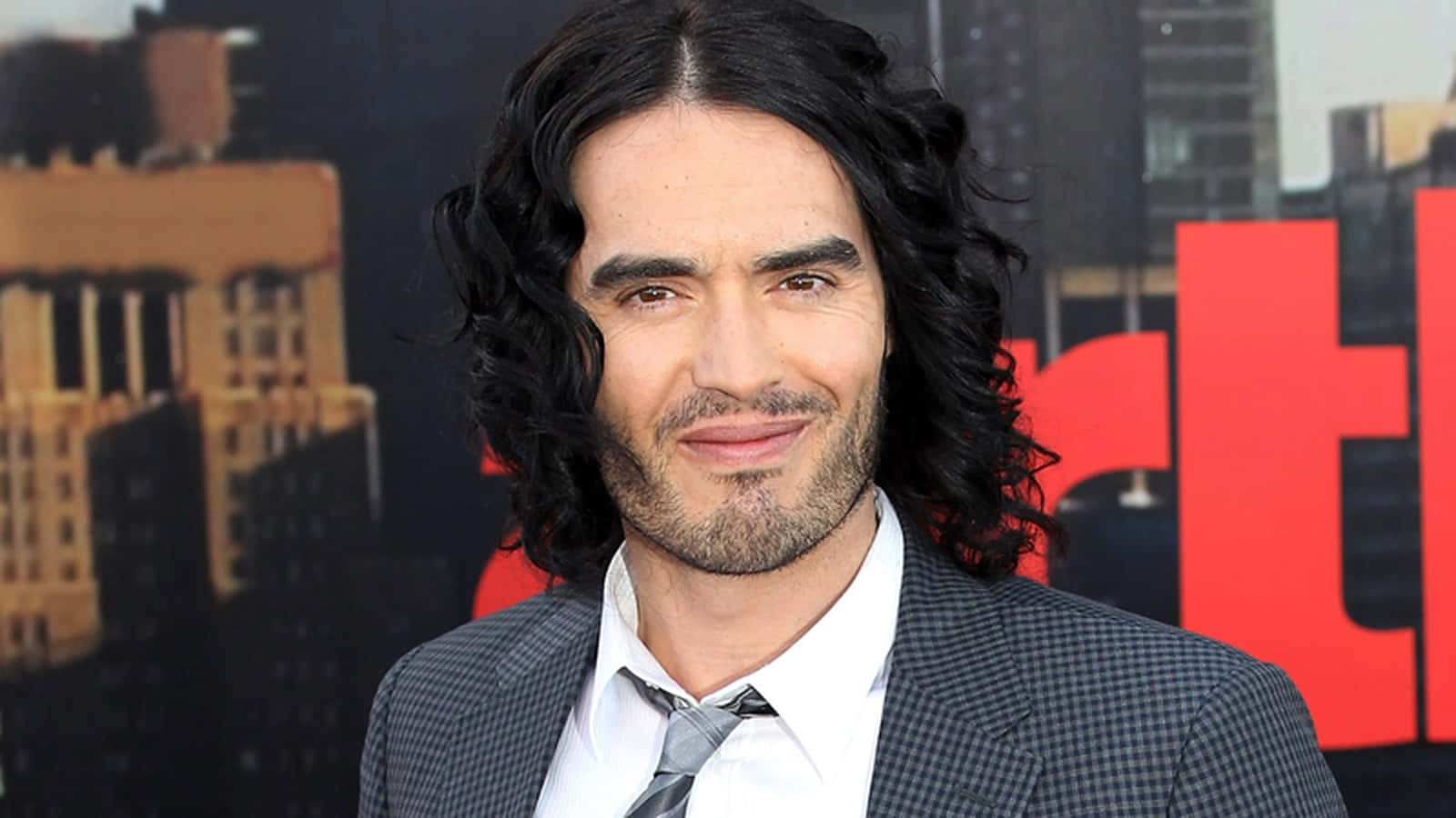 Russell Brand in contemplation Wallpaper