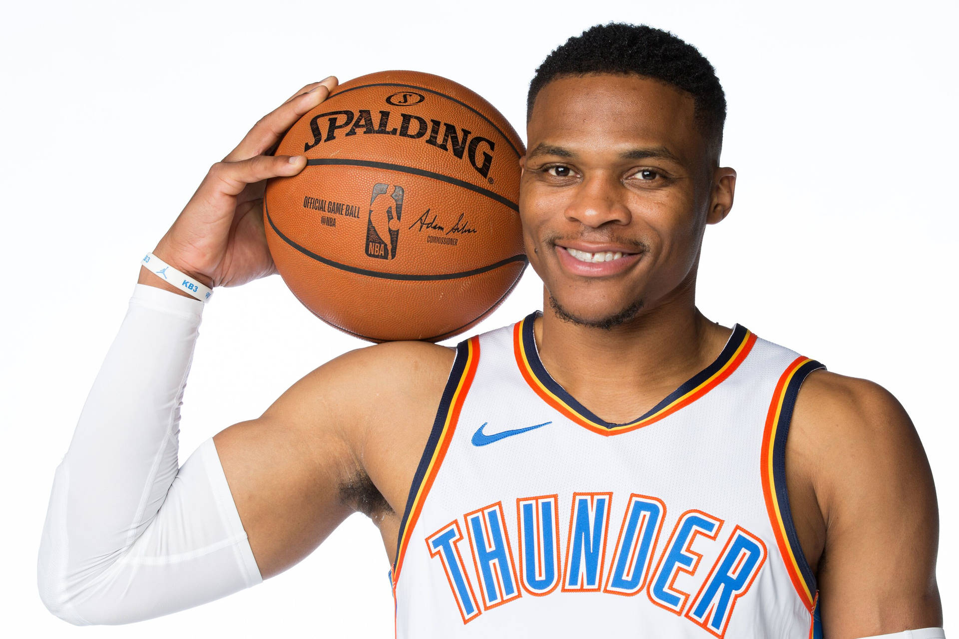 NBA Star Russell Westbrook's dynamic smile. Wallpaper