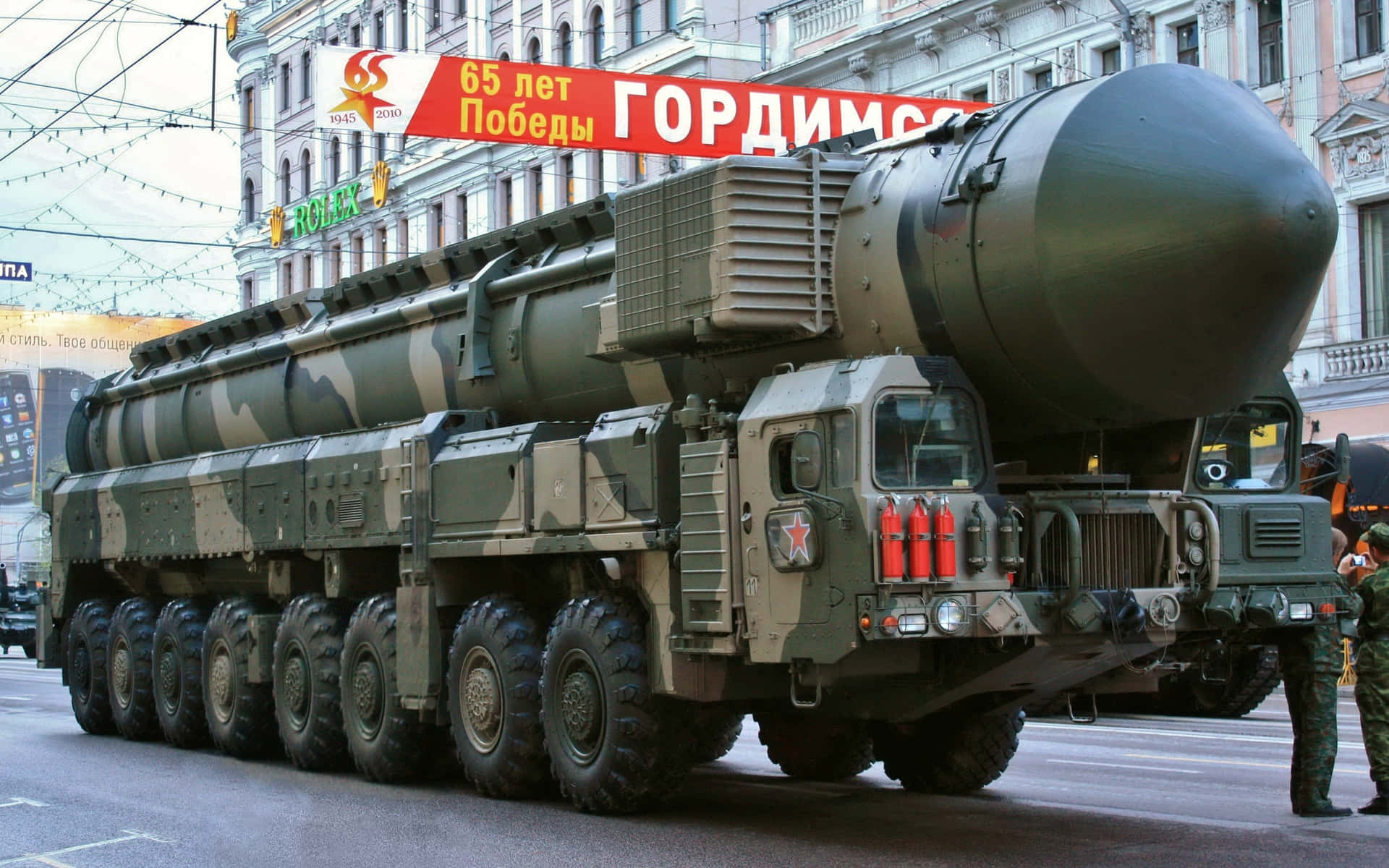 A Large Truck With A Large Missile On It Wallpaper