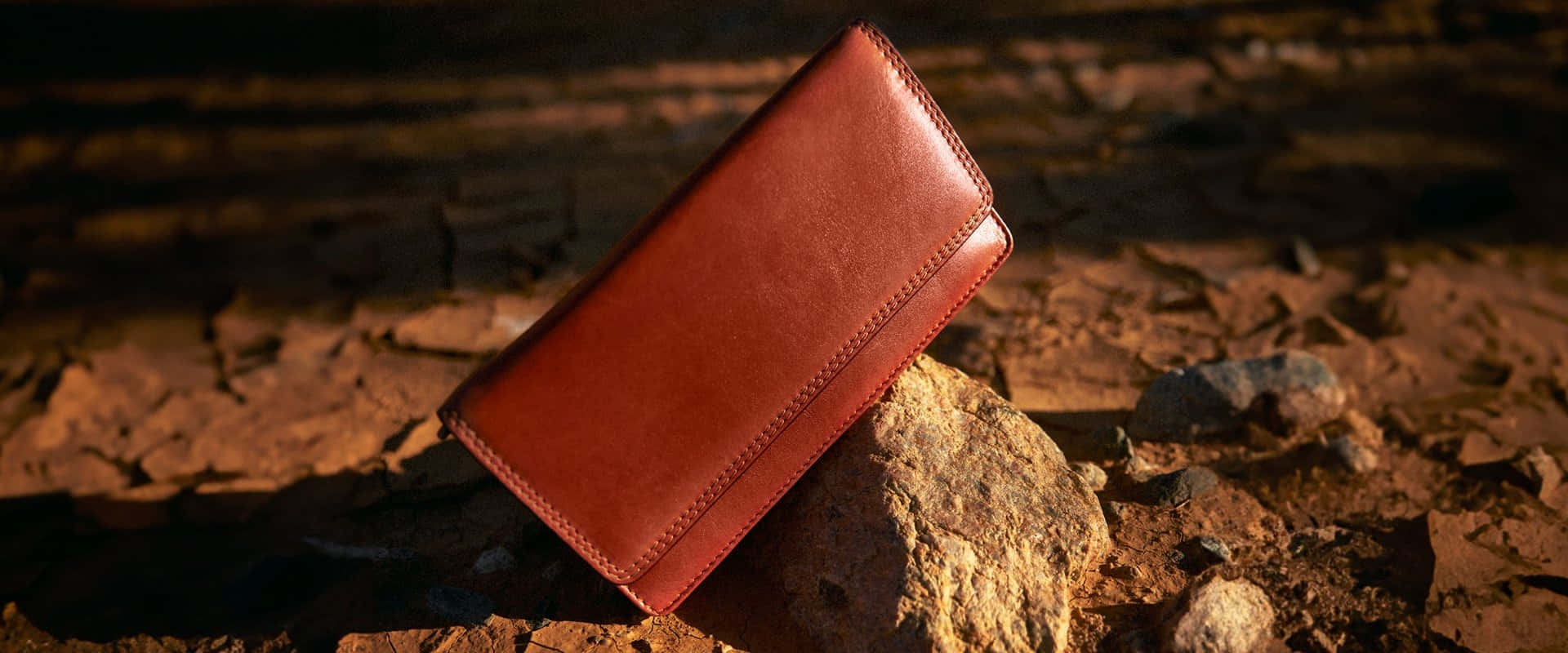 Rustic Leather Wallet Outdoor Setting Wallpaper