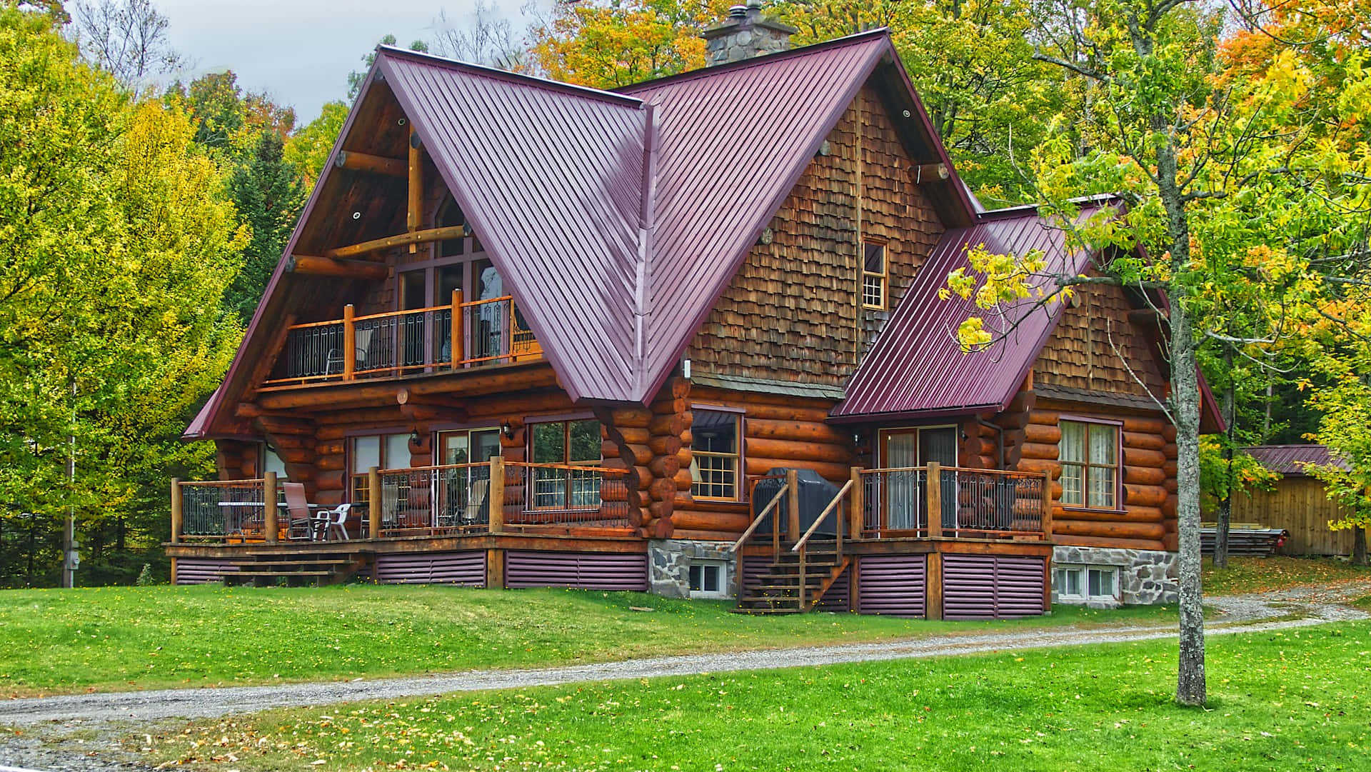 Rustic Log Cabinin Autumn Wallpaper