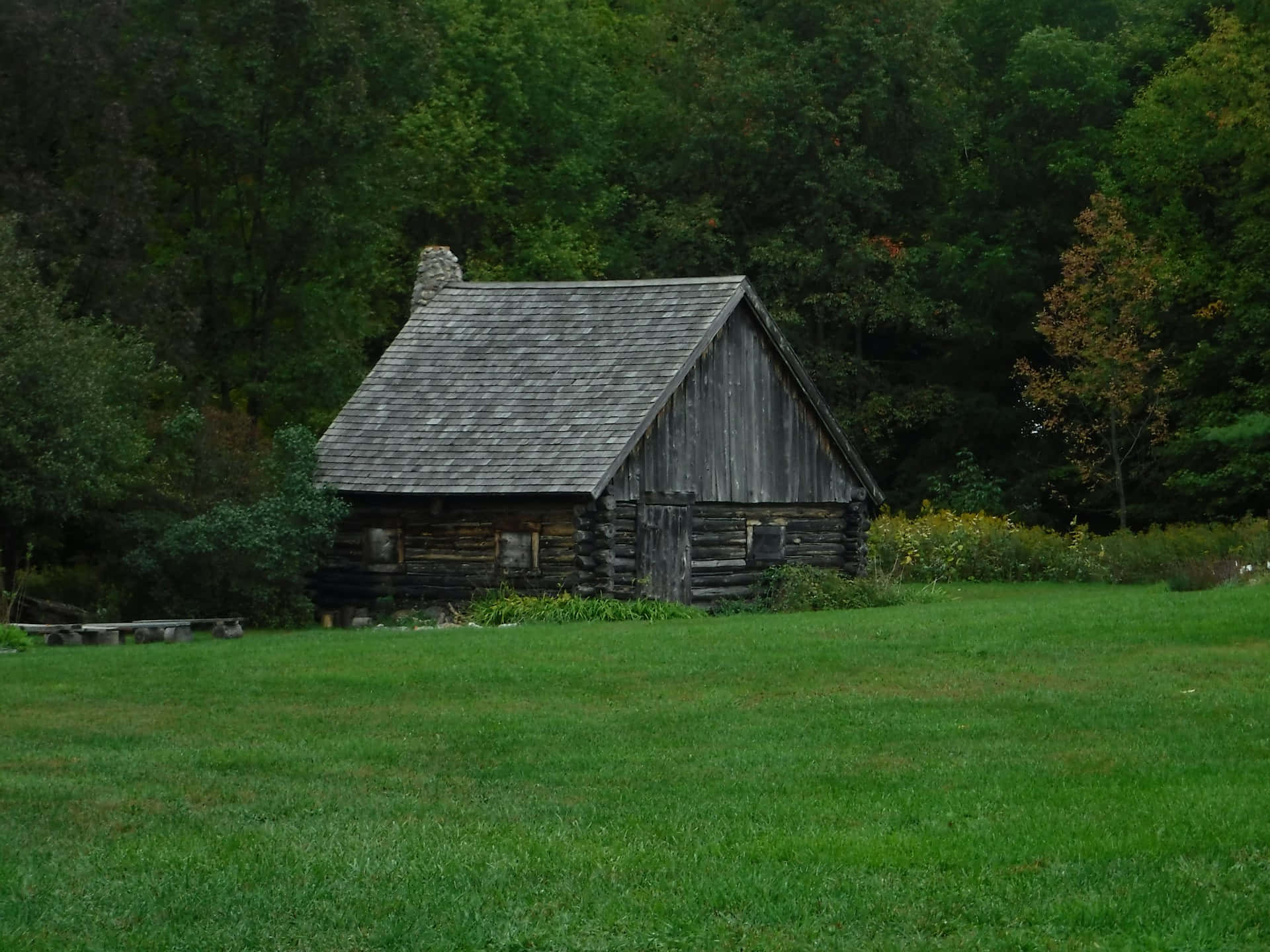 Rustic Log Cabinin Green Meadow Wallpaper