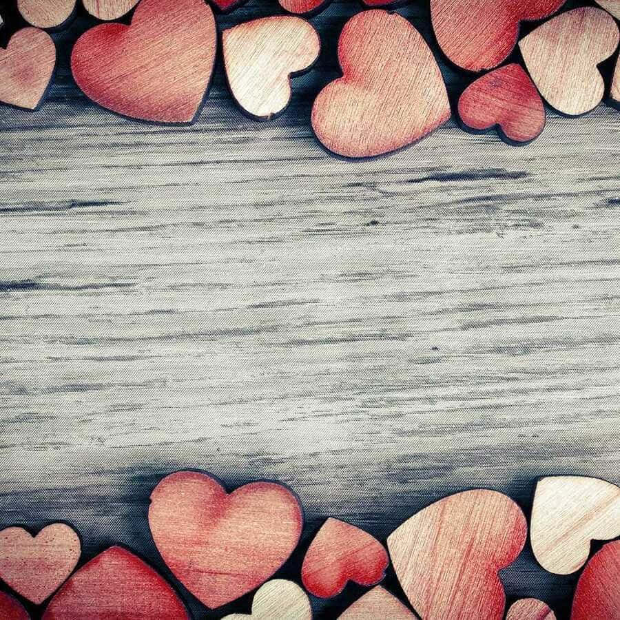 Red Hearts On Wooden Background Wallpaper