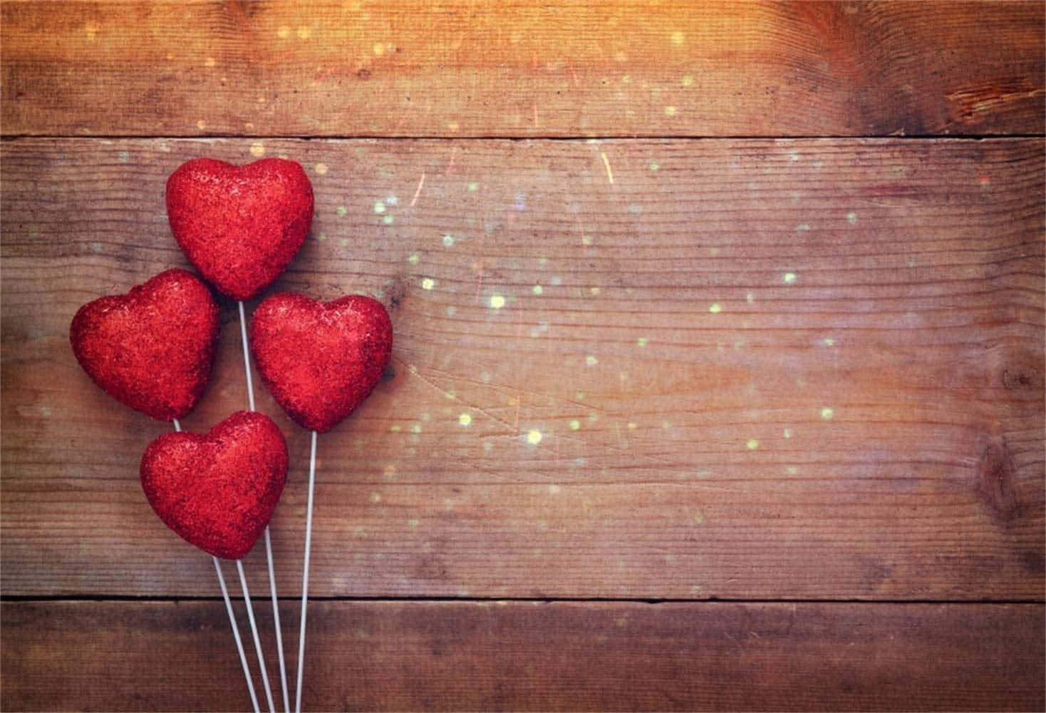 Red Hearts On A Wooden Background Wallpaper