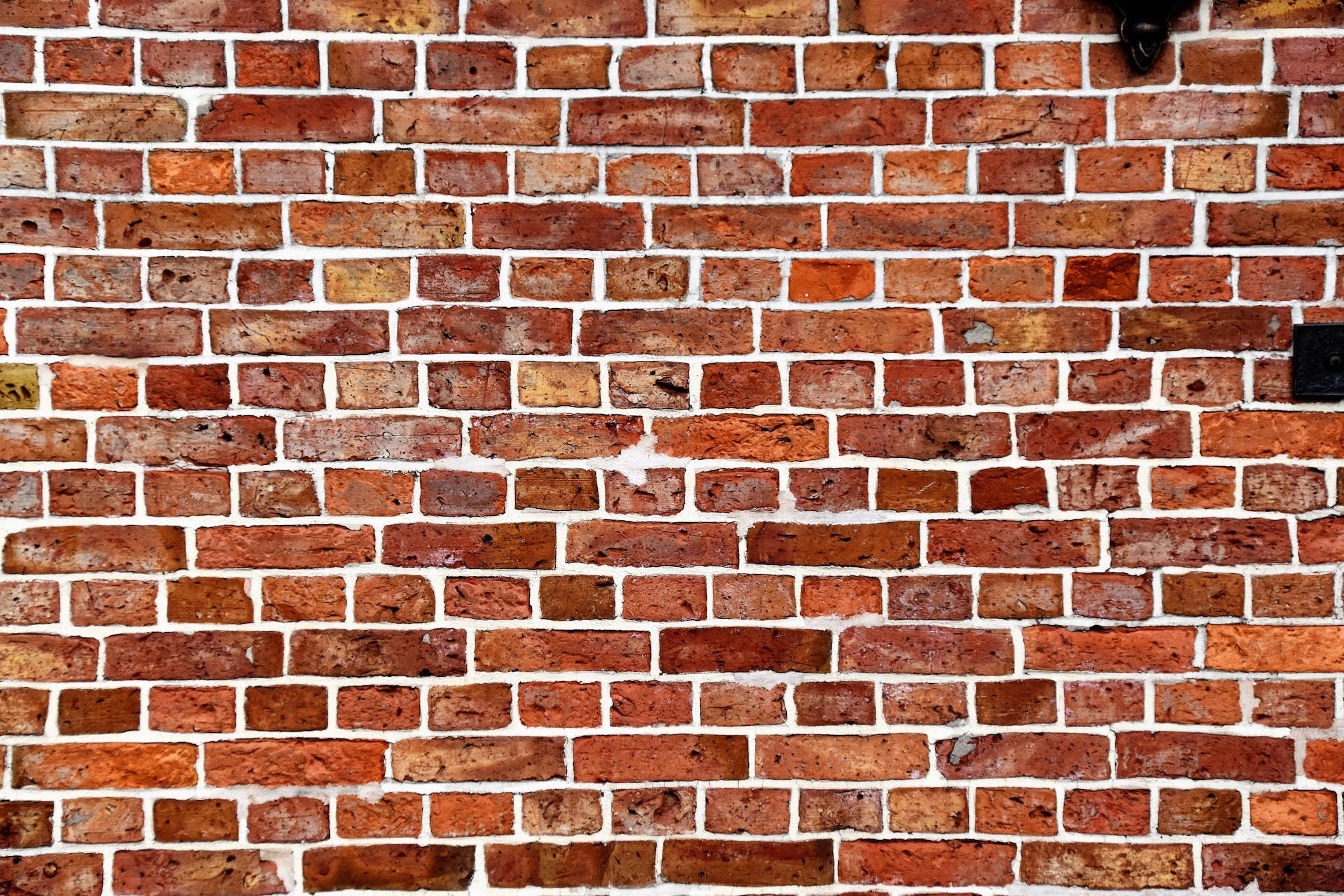 Rusty Brown Brick Wall Wallpaper