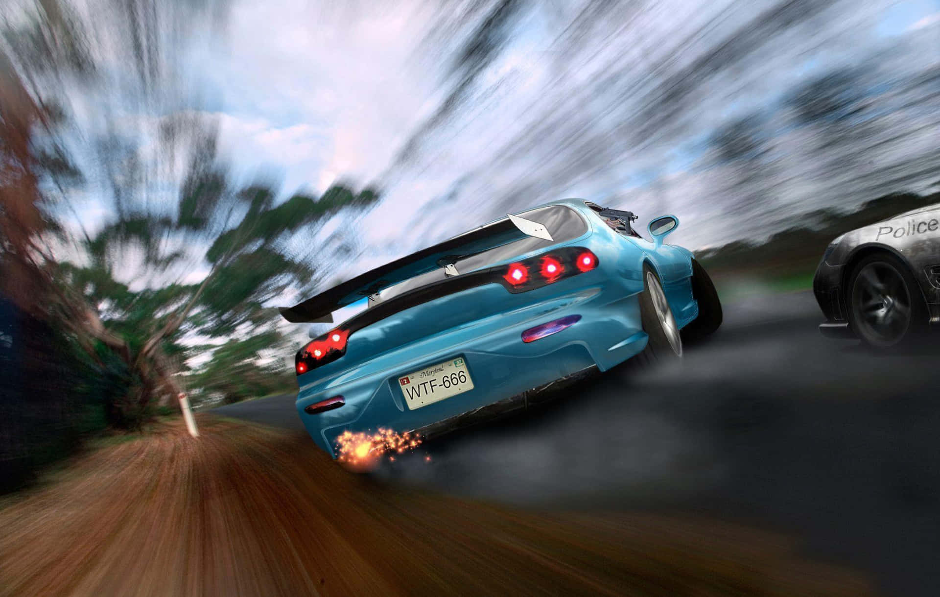 A Blue Car Driving Down A Road With Smoke Coming Out Of It Wallpaper
