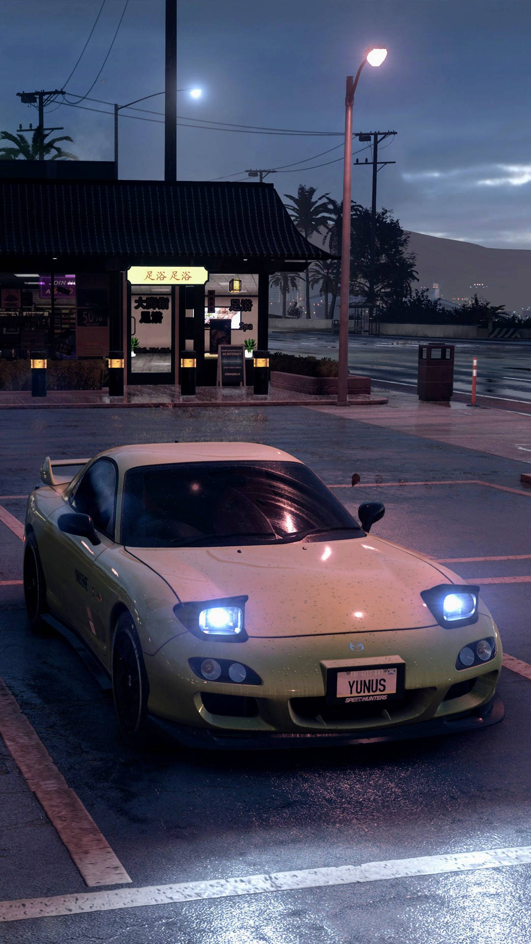 Uncoche Amarillo Está Estacionado En Un Estacionamiento Por La Noche. Fondo de pantalla