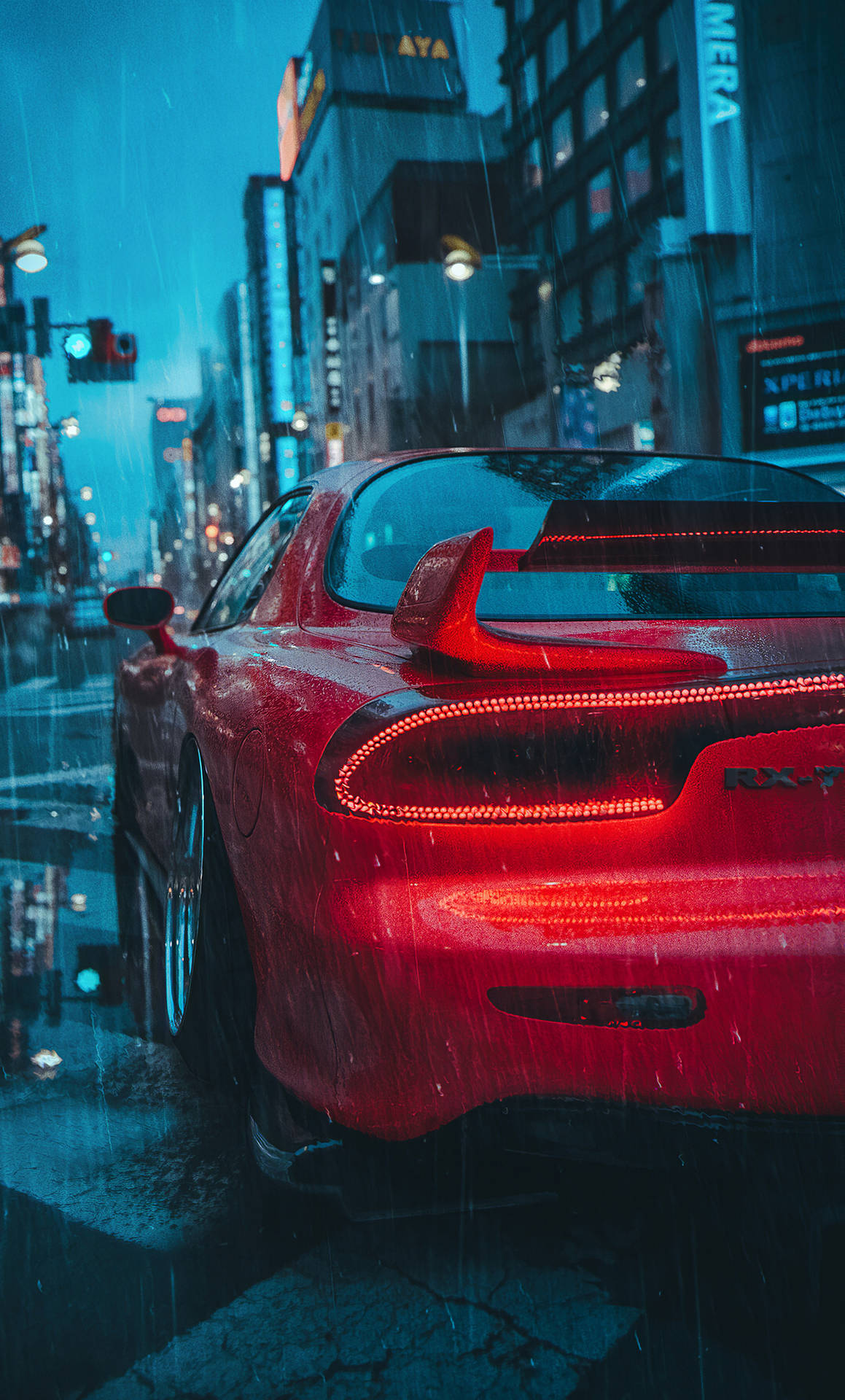 a red sports car is parked on a city street Wallpaper