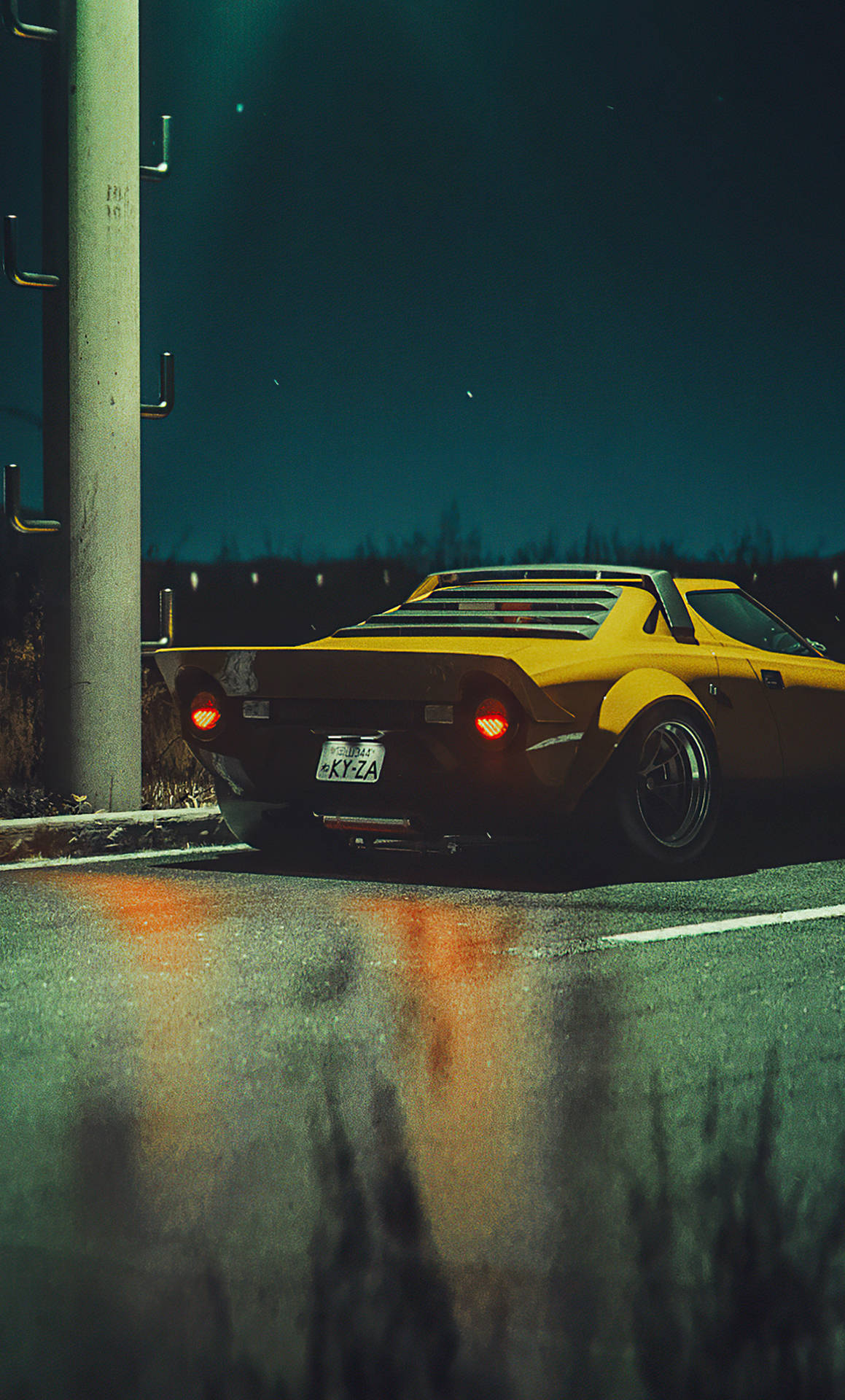 a yellow sports car parked on a street Wallpaper