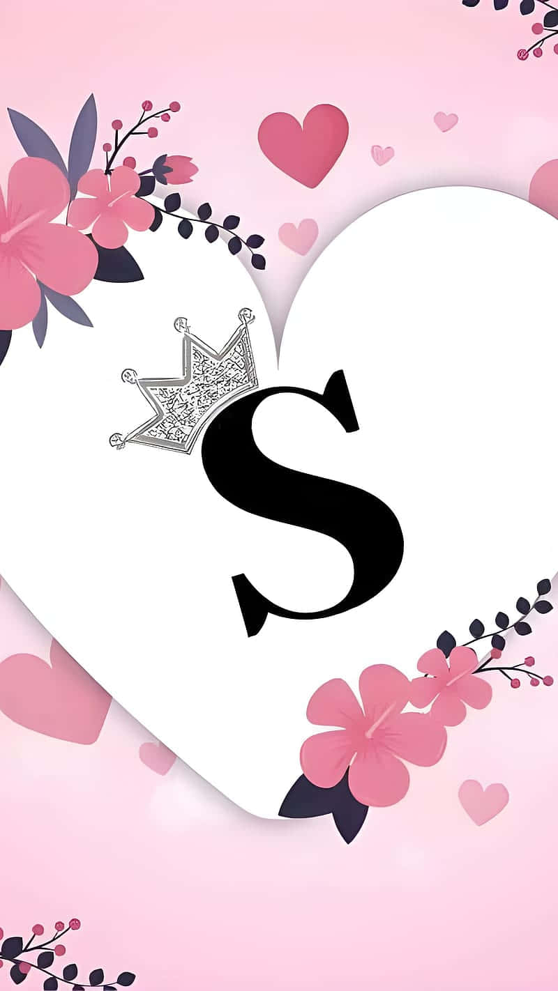 A Pink Heart With The Letter S And Flowers