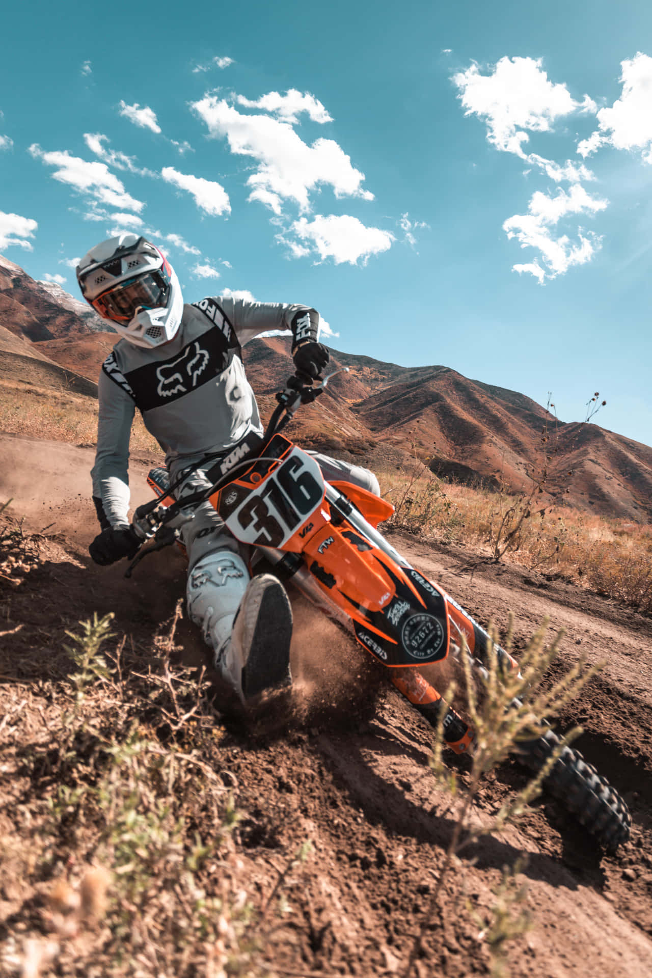 S: Photo Of A Motocross Racer In Action. A Thrilling Moment Frozen In Time On The Dirt Track.