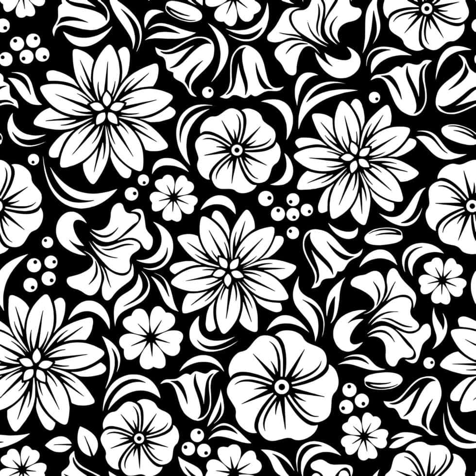 s: Background — Bold black and white floral pattern with stylized blossoms and berries in a repeating seamless design.