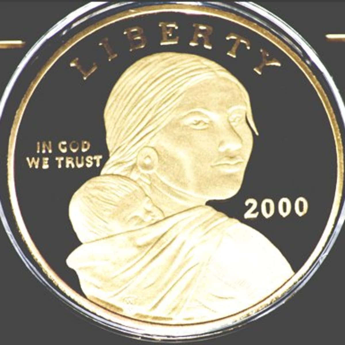 A Gold Coin With An Image Of An Indian Woman