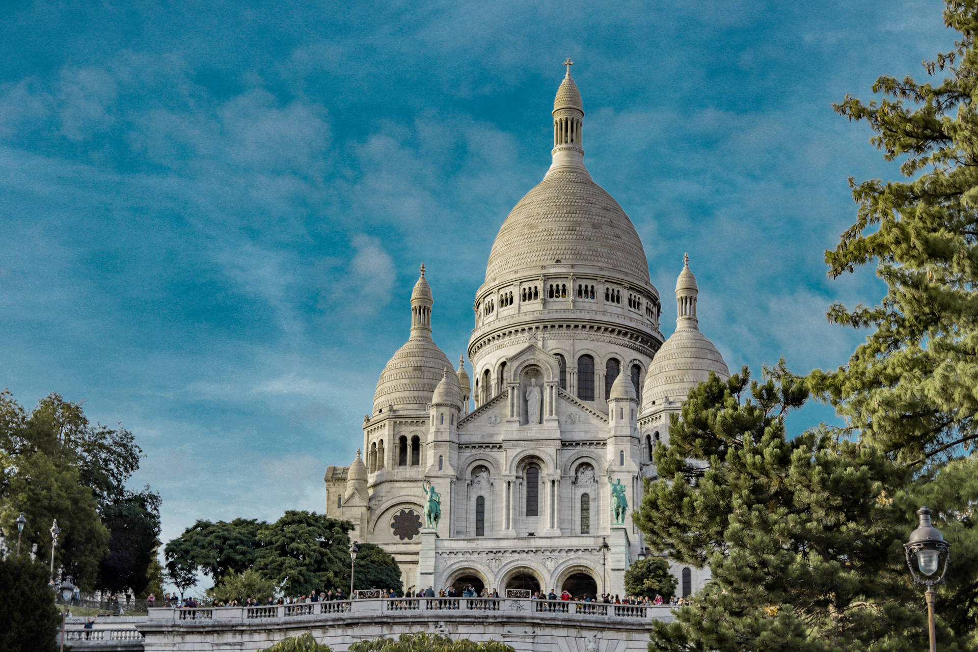 Sacre Coeur Basilica Surrounded By Trees Wallpaper