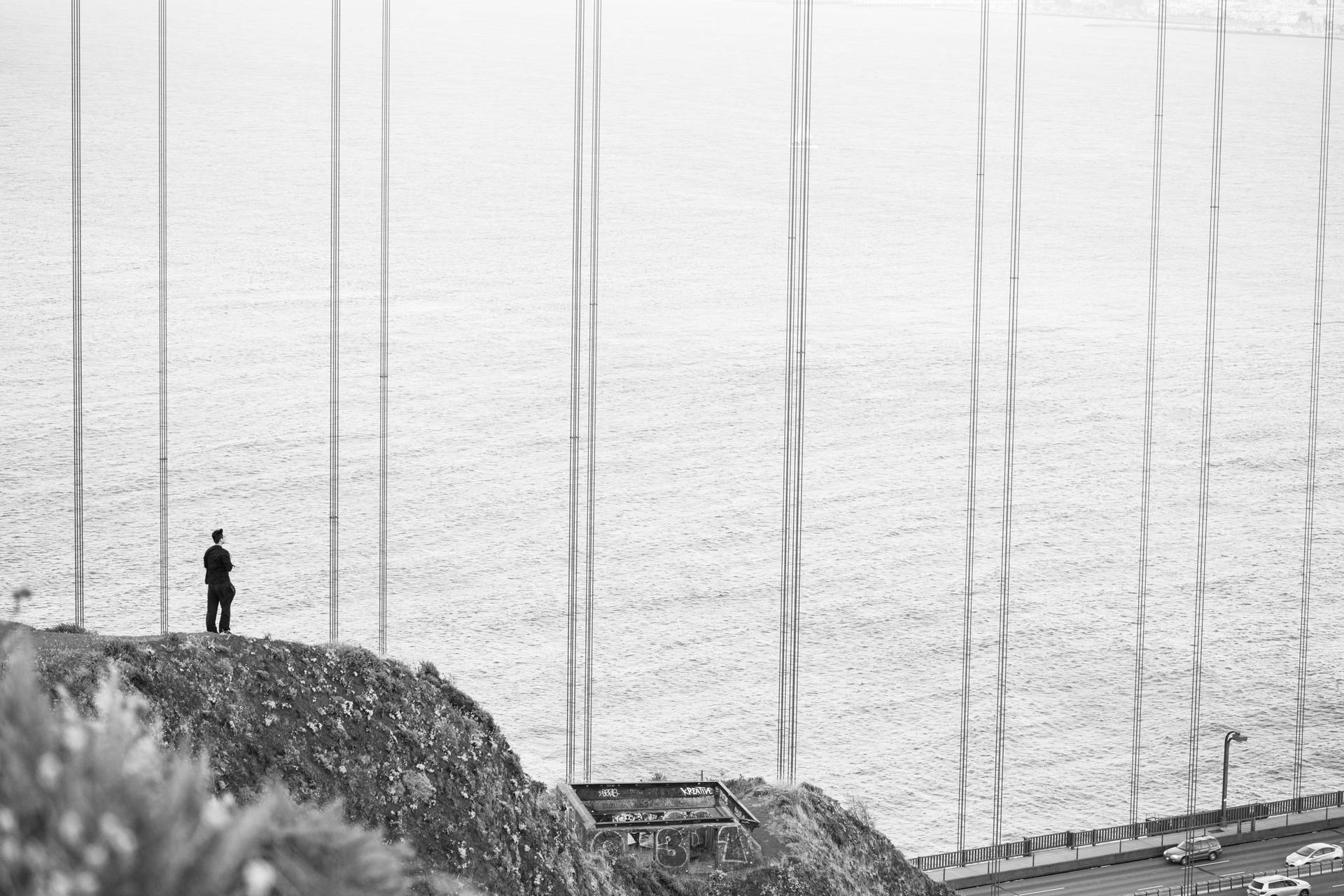 Sad Alone Man At Golden Gate Bridge Wallpaper