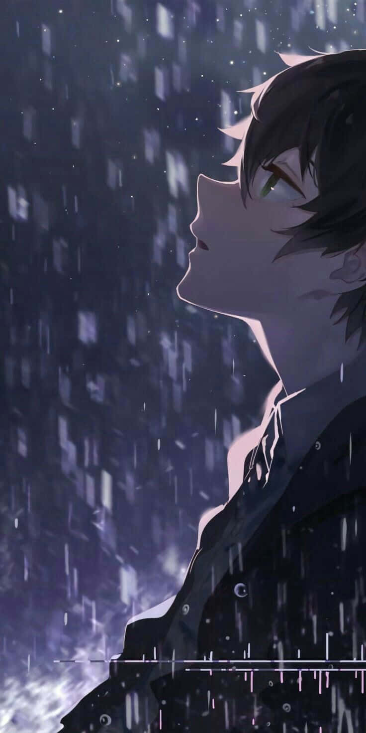 En dreng står i regnen med lukkede øjne Wallpaper