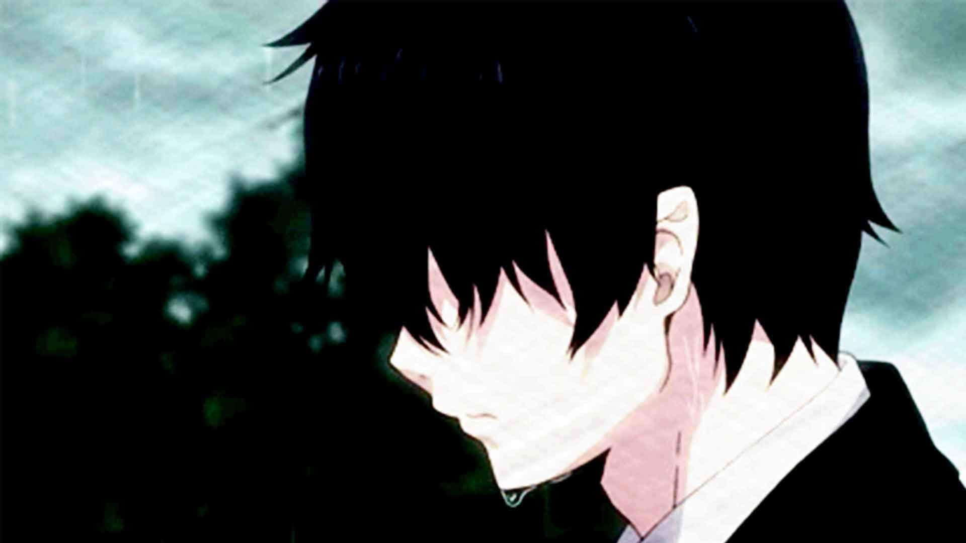 En trist grædende anime pige holder sit hoved i smerte Wallpaper