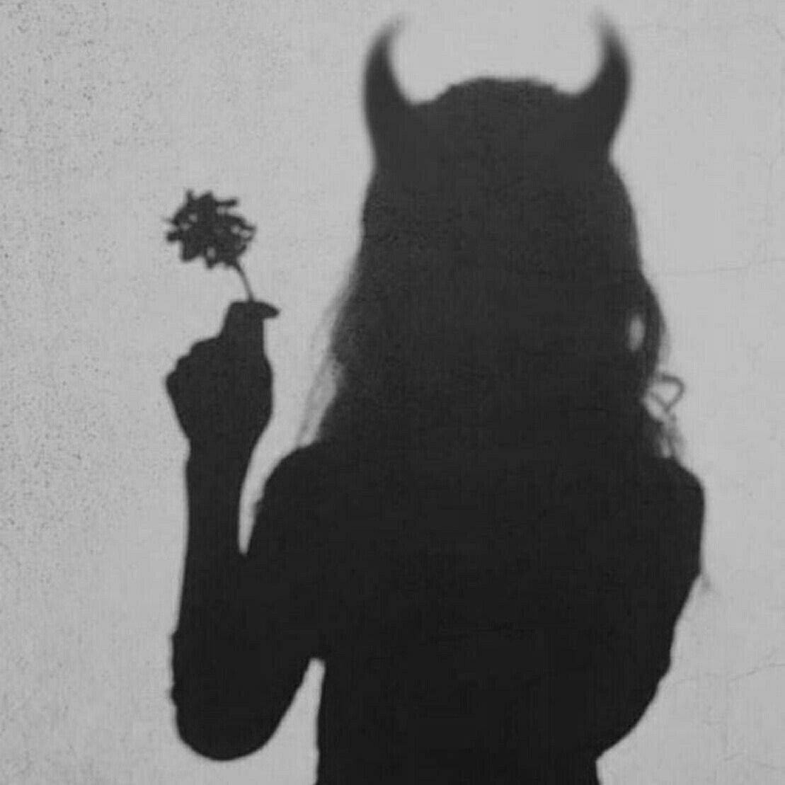 Sad Demon Girl With A Flower Wallpaper