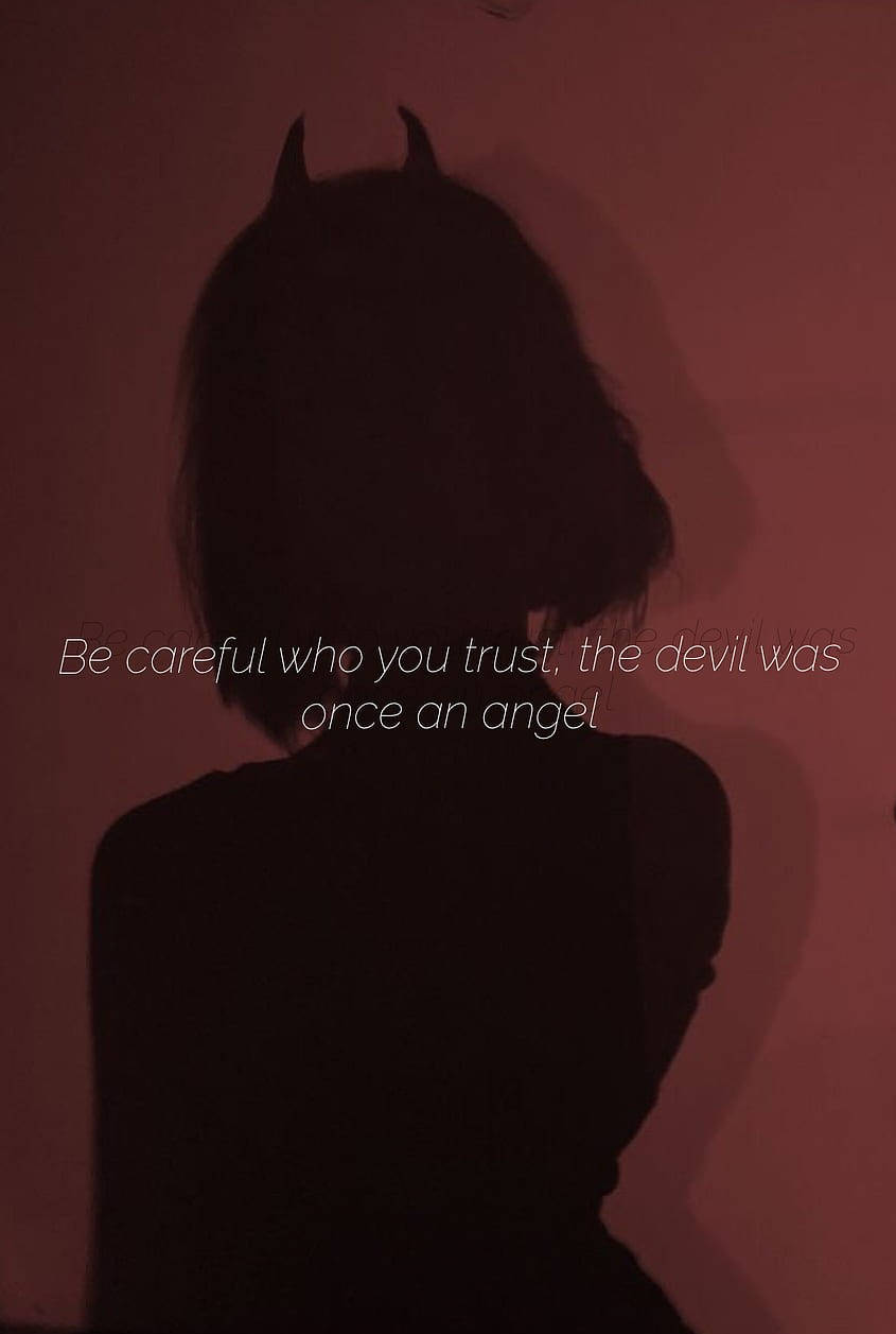 A Woman With Horns And A Quote That Says, Be Careful Who You Trust Wallpaper