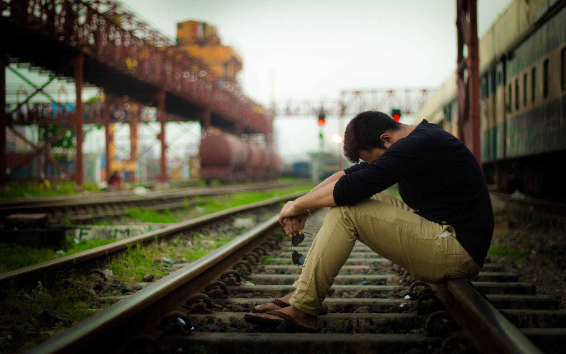 Sad Man Alone On The Railway Background
