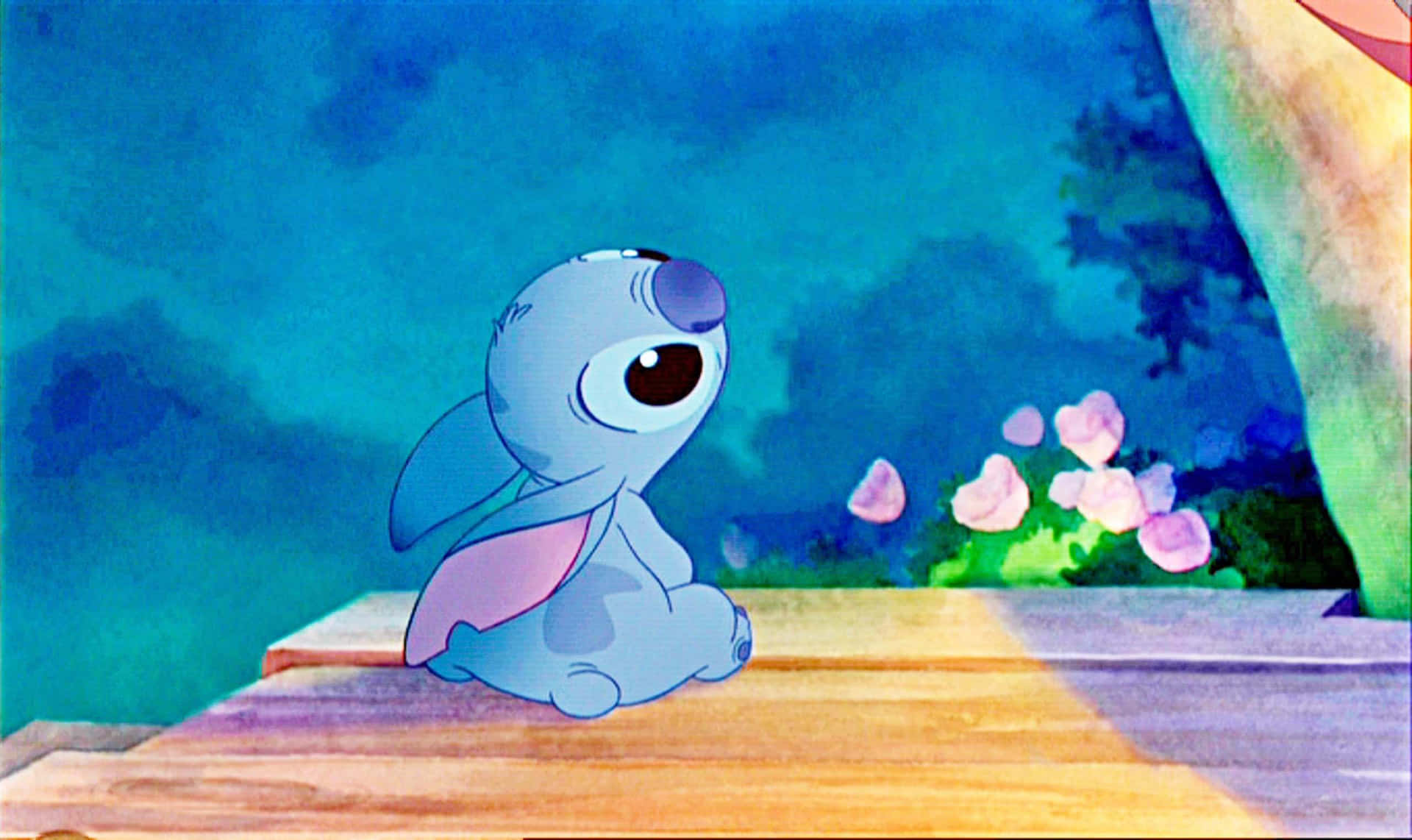 Sad Stitch looks wistfully at the stars, longing for a better tomorrow Wallpaper