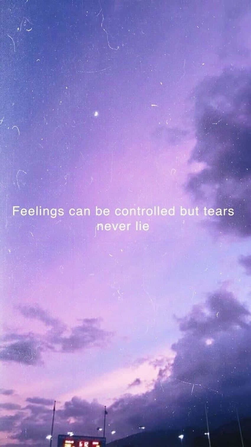 A Purple Sky With The Words Feelings Can Be Controlled But Tears Never Lie Wallpaper