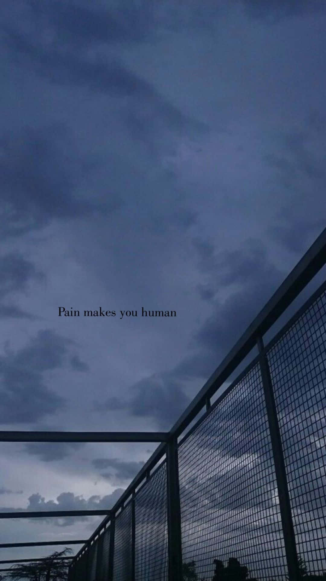 A Fence With The Words,'pale Clouds Over Your Human' Wallpaper