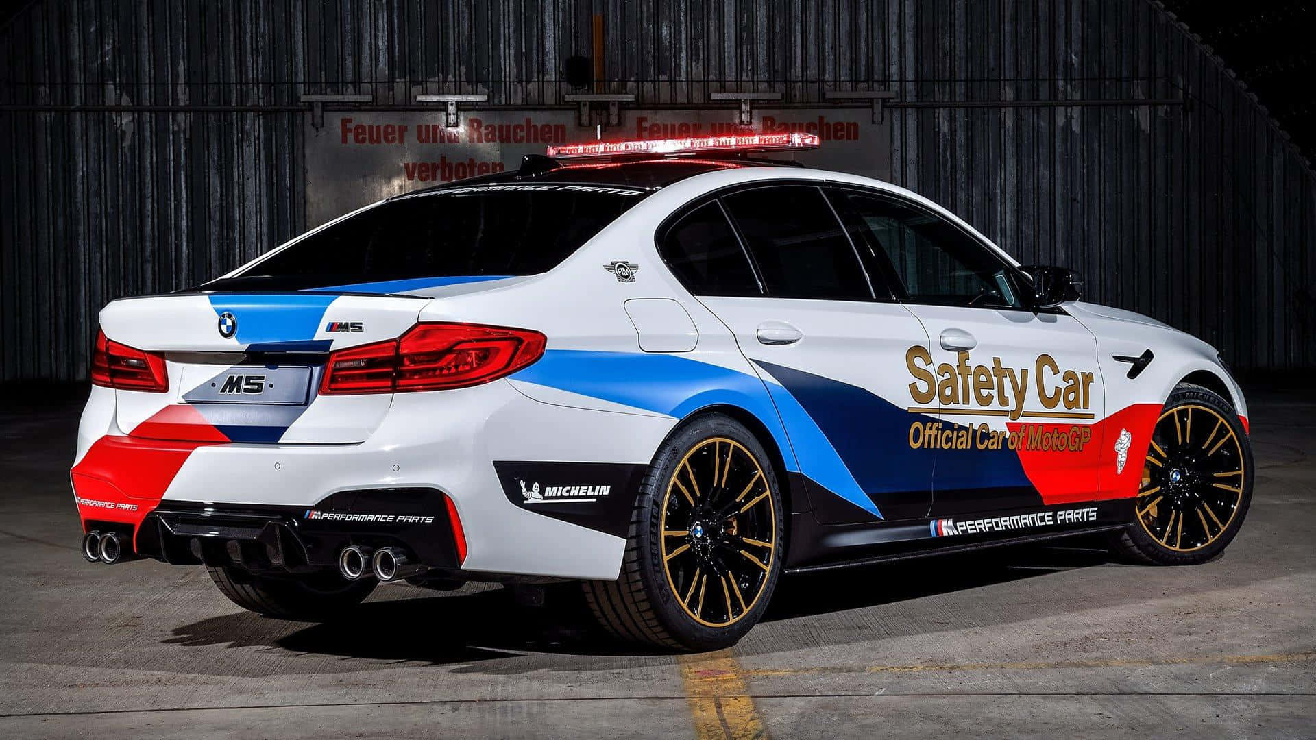 High-speed safety car on the track Wallpaper