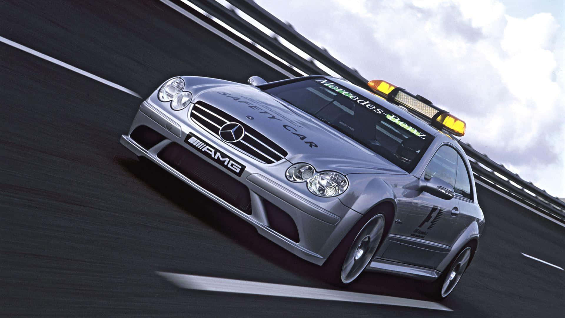 High-performance safety car on the racetrack Wallpaper