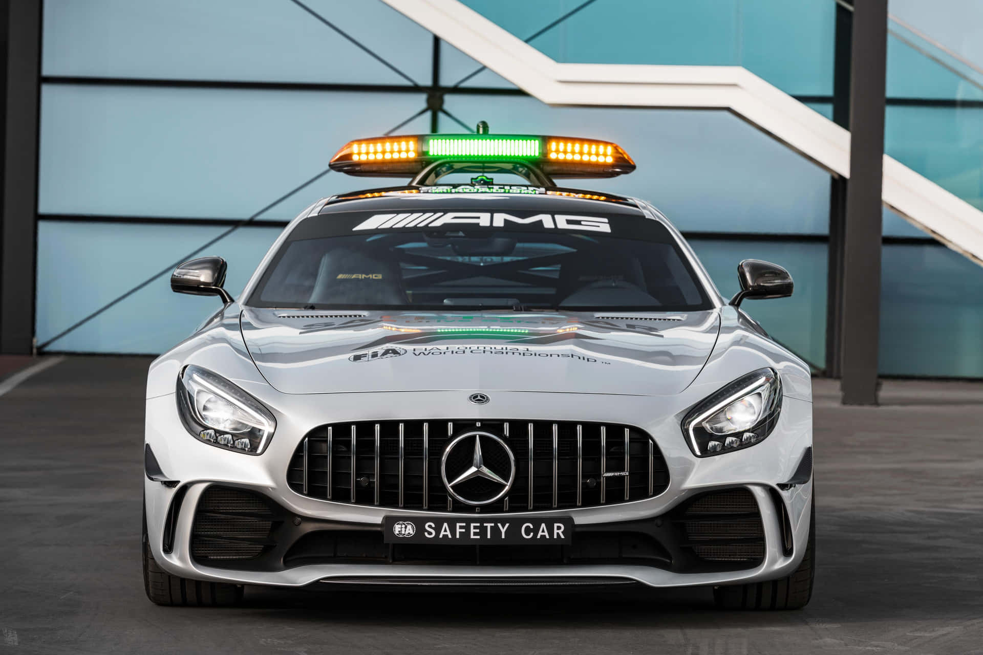Modern Safety Car in Action on a Racetrack Wallpaper